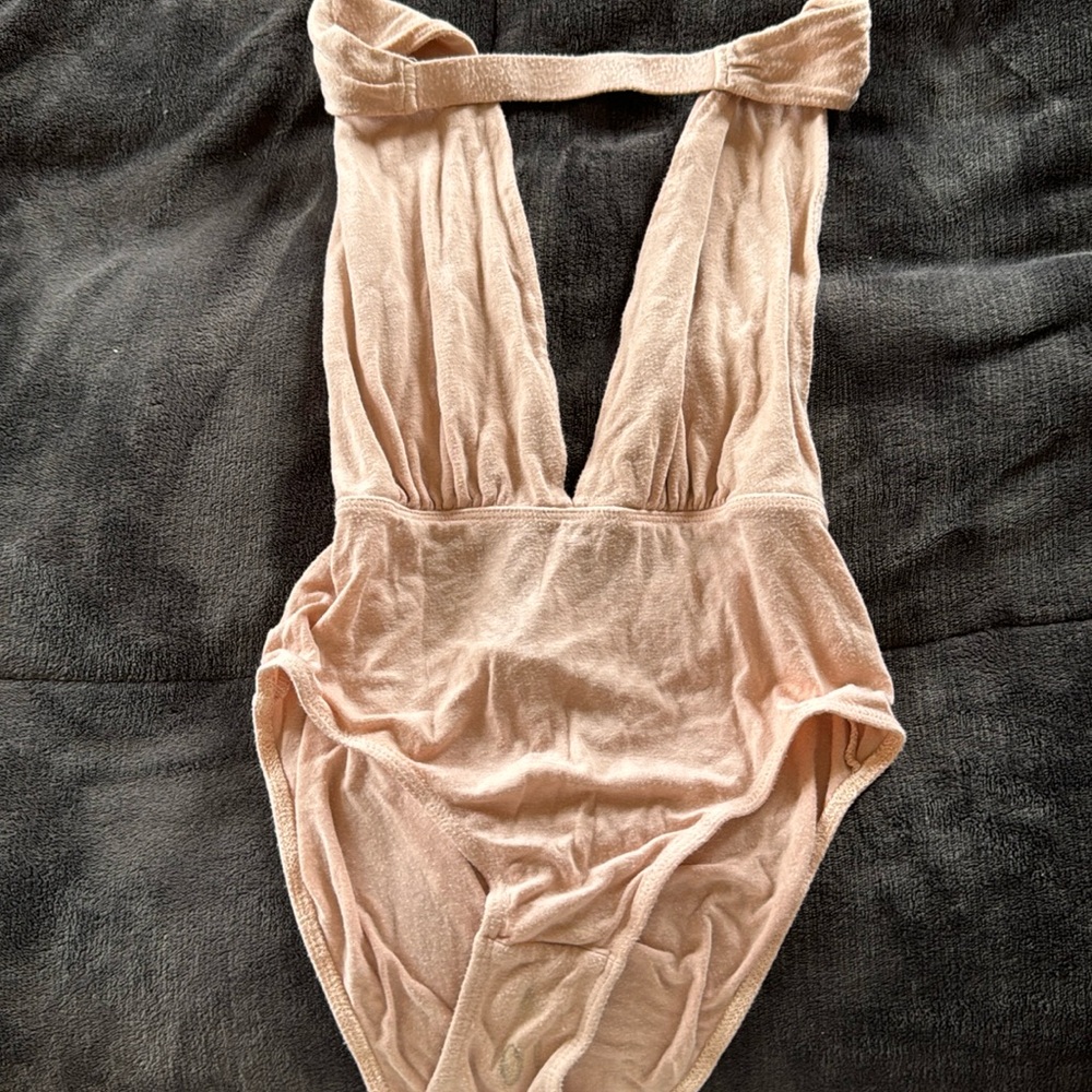 Light pink, deep V, open back bodysuit